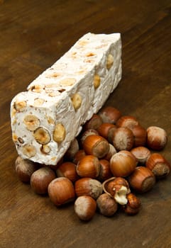 nougat with hazelnut on wooden table
