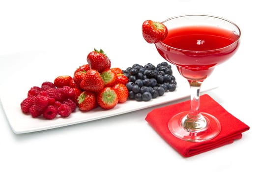 fruit juice with berries on white background
