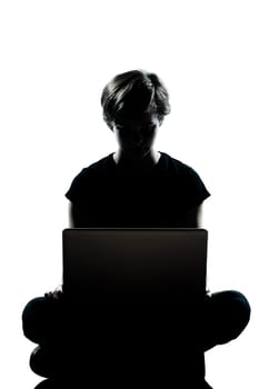 one caucasian young teenager silhouette boy or girl full length in studio cut out isolated on white background