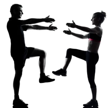 one couple man woman exercising workout aerobic fitness posture full length silouhette on studio isolated on white background
