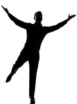one caucasian business man  happy spreading arms silhouette Full length in studio isolated on white background