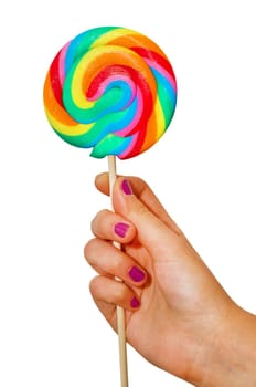 Colorful lollipop in hand