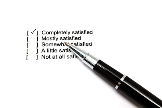 Pen and questionnaire on white background