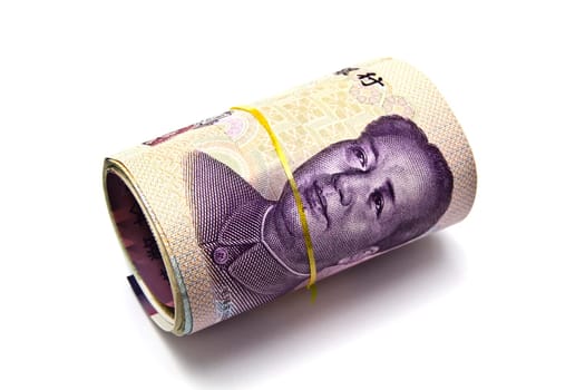 Roll of chinese money closeup on white background