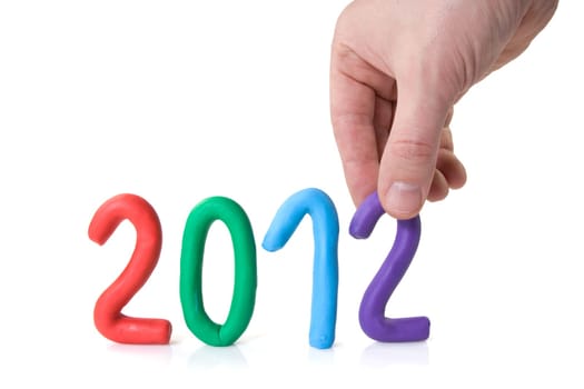 Hand put plasticine figures 2012, new year concept