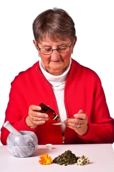 Senior woman with natural remedy