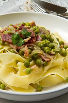 tagliatelle with fresh peas and  diced ham
