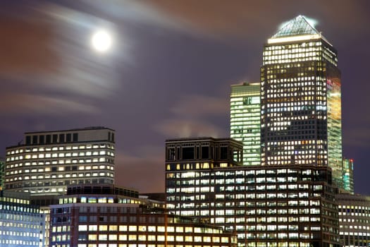 Full moon over London skyscrapers