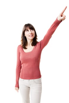 Beautiful woman pointing up. Studio shot with isolated white background.