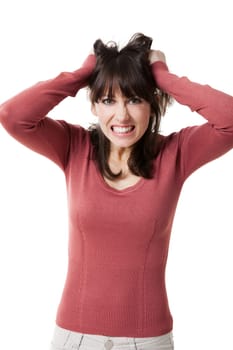 Beautiful woman pulling hair in despair. Studio shot with isolated white background.