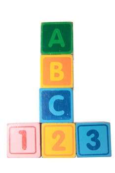 toy letter and number blocks against a white background that spell abc 123 with clipping path