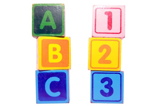 toy letter and number blocks against a white background that spell abc 123 with clipping path