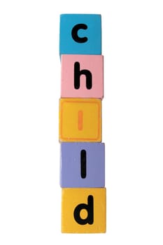 assorted childrens toy letter building blocks against a white background that spell child with clipping path