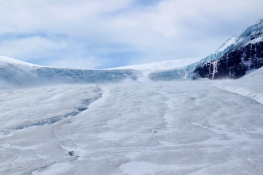 Cold winds blow down the Athabasca Glacier in Jasper National Park - Canada.