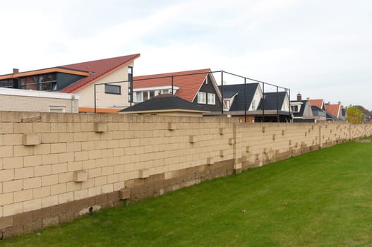 residential area behind a wall