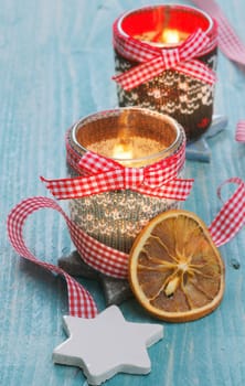 christmas light with dried fruits and a red-white bow