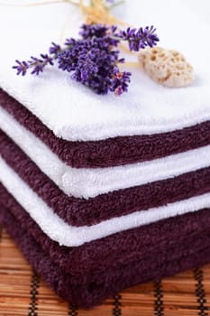 Stack of towels with lavender