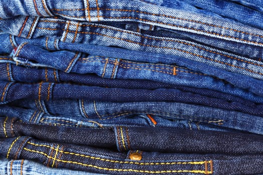 Stack of different jeans - detail