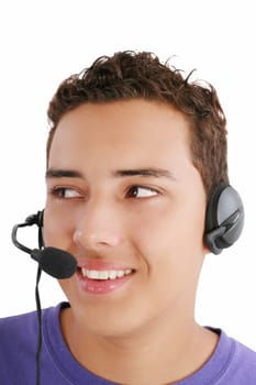 Smiling businessman talking on headset against a white background