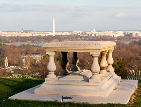 Memorial table outside Arlington House in Cemetery overlooks Washington DC at sunset
