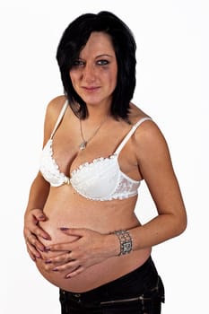 Crying pregnant woman on the white background
