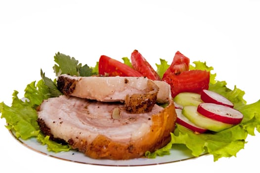 roast pork in tomatoes on the white background