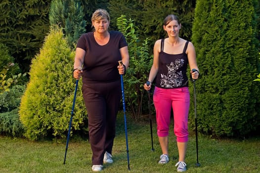 Mother and daughter growing Nordick walking on-air sports