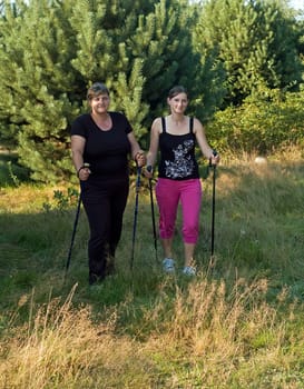 Mother and daughter growing Nordick walking on-air sports