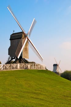 Two Wind mill and green lawn at Brugge - Belgium