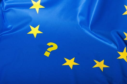 Euroscepticism - Detail of Silky Flag of Blue European Union EU Flag Drapery With Question Mark