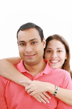 Young love couple smiling. Over white background