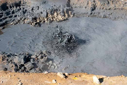 in the boiling mud geysers in Iceland Námafjall