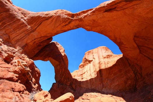 Double Arch spans the valley floor of Arches National Park in Utah.
