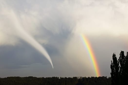 Tornado with rainbow