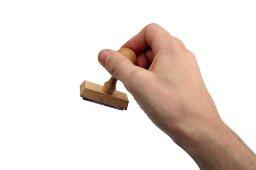 man hand holding a wooden stamp. white background