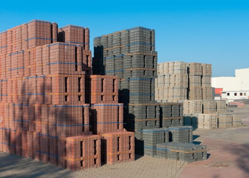 large area with piled up bricks ready for transport