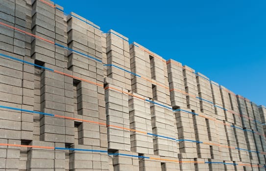 highly piled up bricks ready for transport