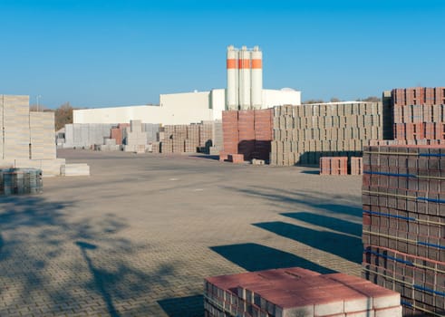 large area with piled up bricks ready for transport