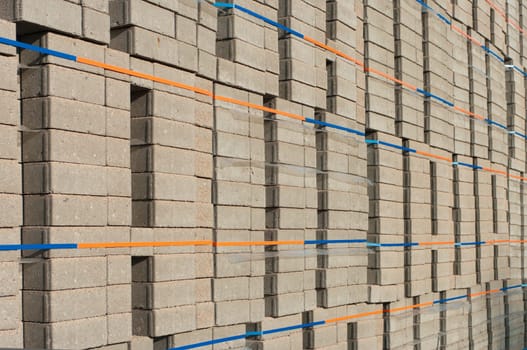 highly piled up bricks ready for transport