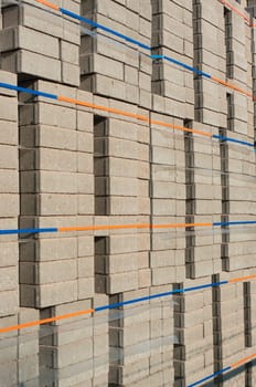 highly piled up bricks ready for transport