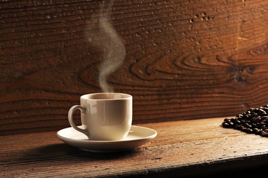 cup of coffee on the wooden table