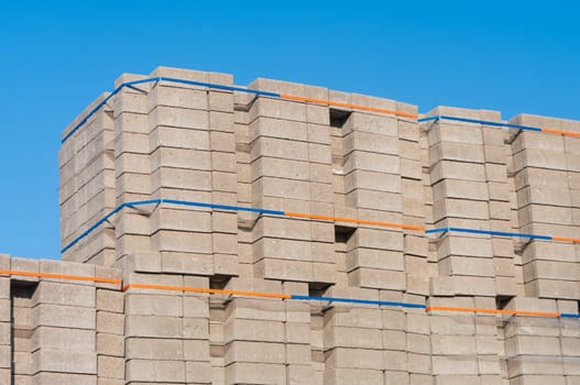 highly piled up bricks ready for transport