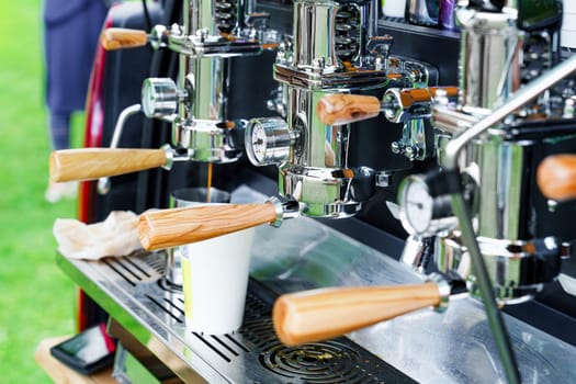 Professional Coffee Machine Installed in the Back of a Car: Coffee Service for Outdoor Events and Open Air