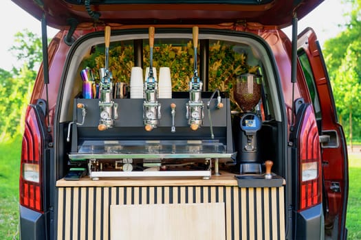 Professional Coffee Machine Installed in the Back of a Car: Coffee Service for Outdoor Events and Open Air