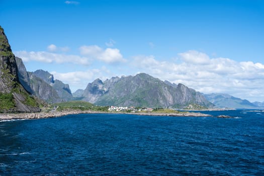 Summer sunny day at Lofoten, Norway, Nordland. Landscape with dramatic mountains and sea, ocean. fjord in the Lofoten Islands