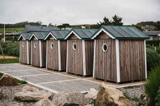 Wooden houses on the ocean coast bathing cabins at Saint marguerite sur mer