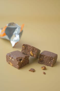 chocolate and oats protein bars on table .