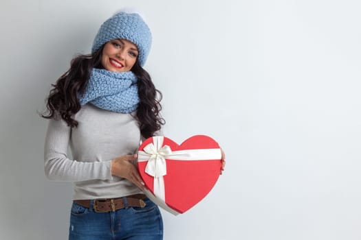 Woman holding heart shaped box, Valentines day love concept