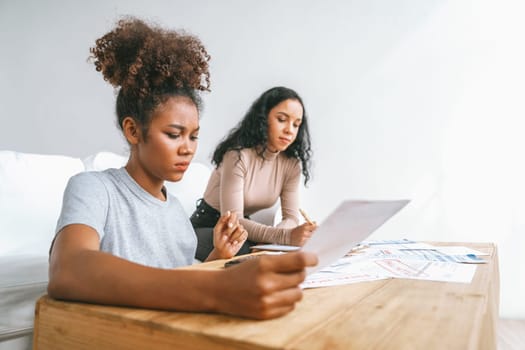 Stressed African American women has financial problems with credit card debt to pay crucial show concept of bad personal money and mortgage pay management crisis.