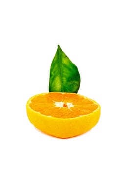 Ripe sliced mandarin with leaf isolated on white